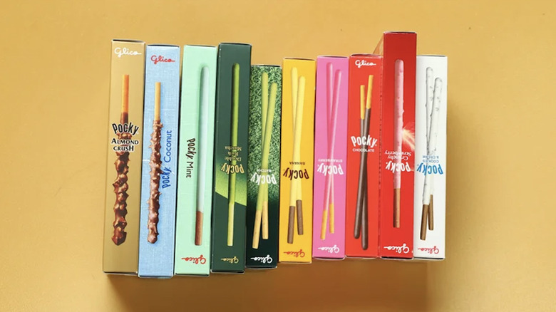 assortment of pocky flavors on yellow