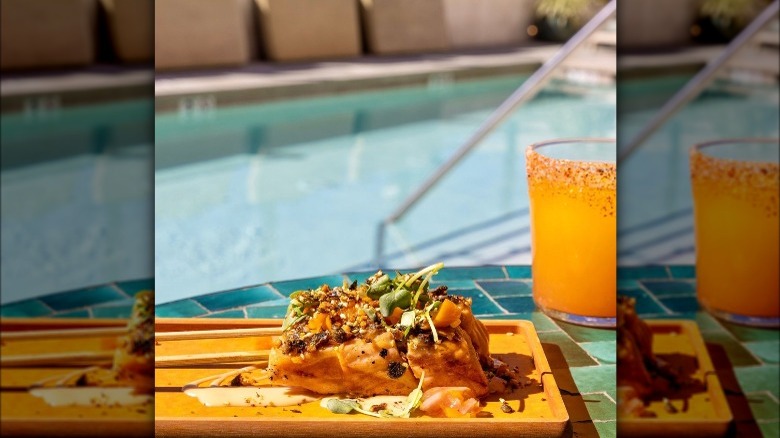 Drinks and food by pool