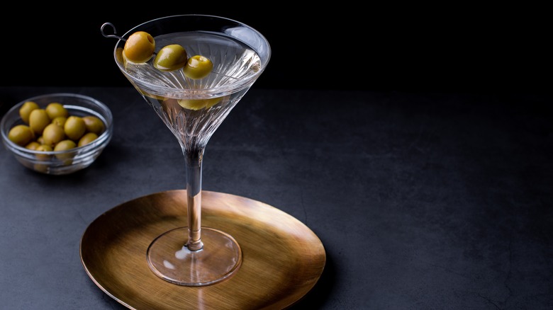 Martini with olive garnish