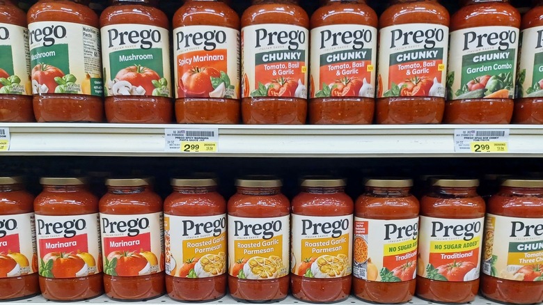 Jars of Prego sauce on grocery shelf