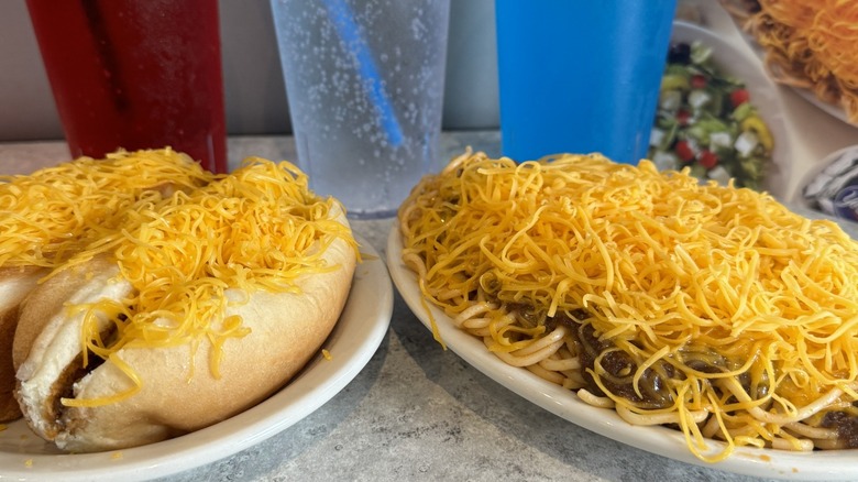 Skyline Chili cheese-covered hot dogs and spaghetti chili