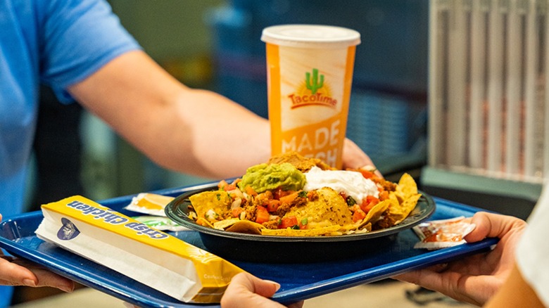 Tray of food being served at the counter at TacoTime