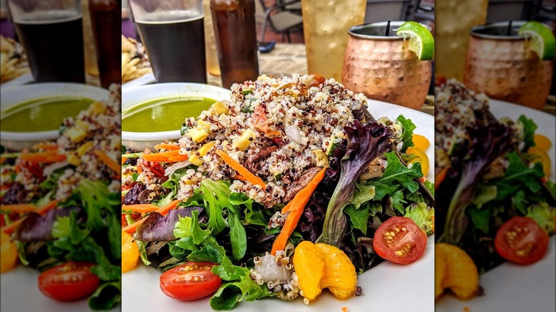 quinoa with greens, tomatoes, and carrot