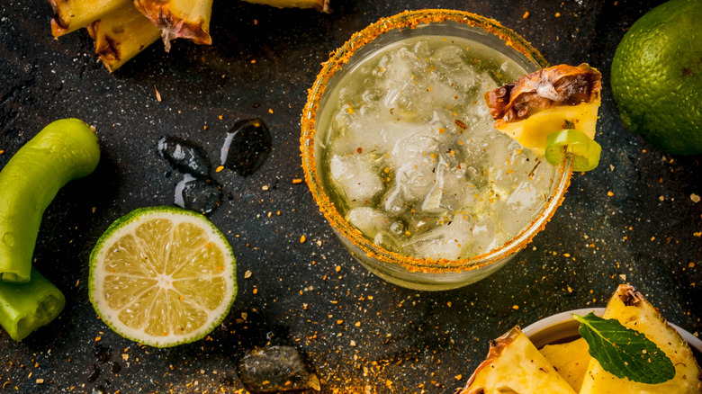 pineapple margaritas with sugar and chili powder rim