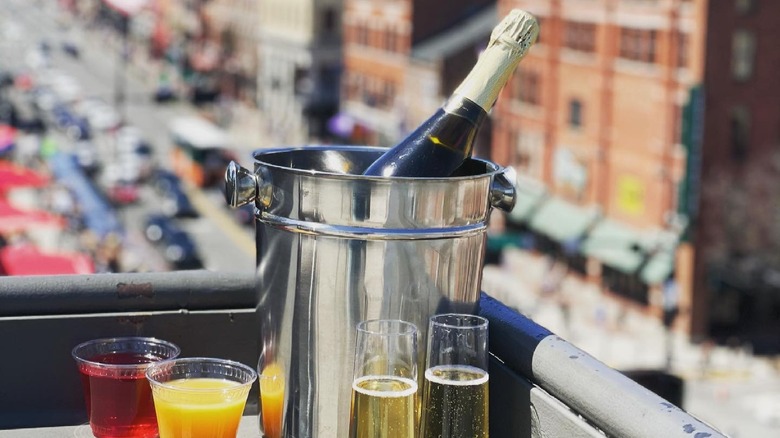 champagne in bucket with glasses on rooftop bar for Nashville Underground in Nashville, Tennessee