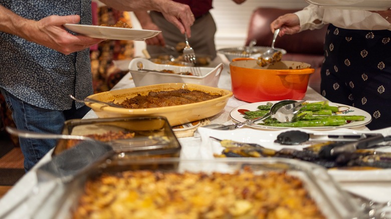 potluck dishes on buffet table