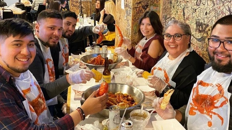 Diners eating crab legs