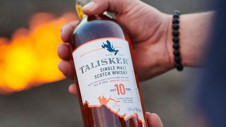 Talisker 10 bottle hands flame