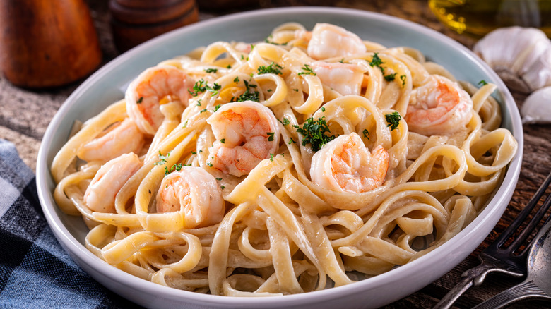 pasta with shrimp served in bowl