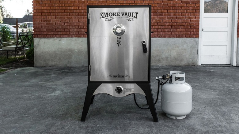 Camp Chef Smoke Vault outside of a house