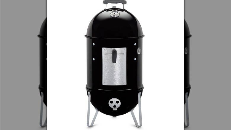 Weber 14.5-inch smoker against a white background