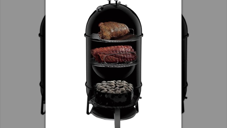 Weber 18-inch smoker against a white background