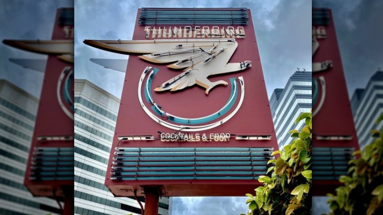 Thunderbird signage and clouds