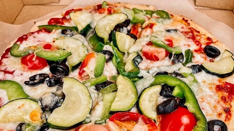 Vegetable pizza in a box