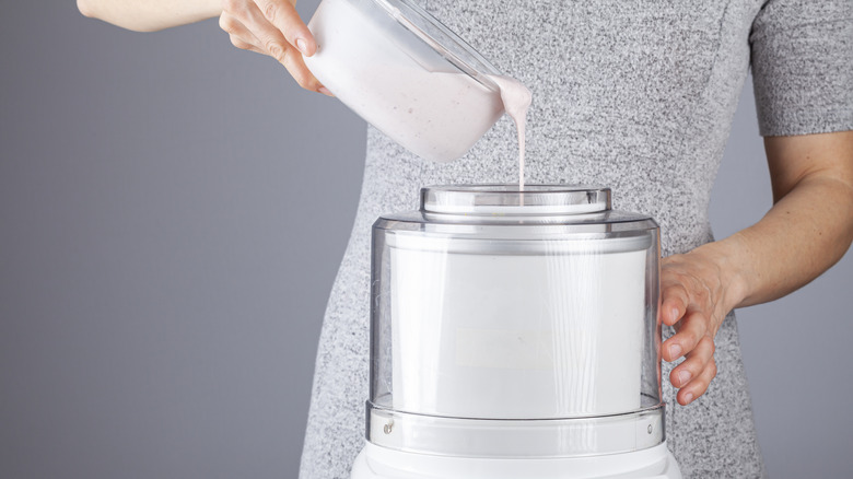 Pouring mixture into ice cream maker