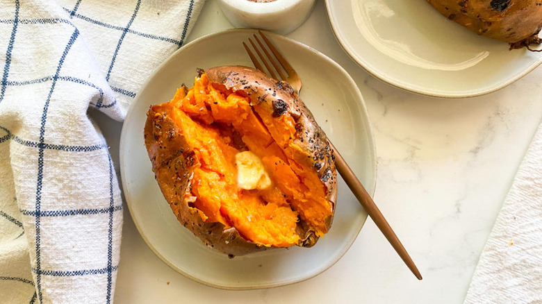 Plated sweet potato with butter