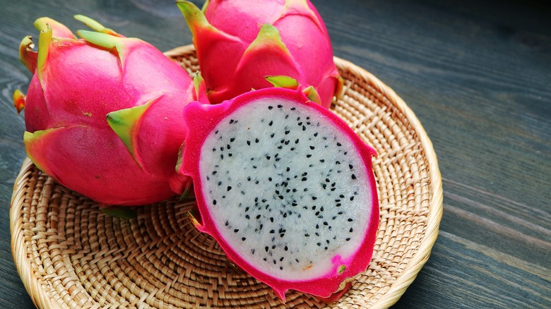 3 dragon fruit, one cut in half