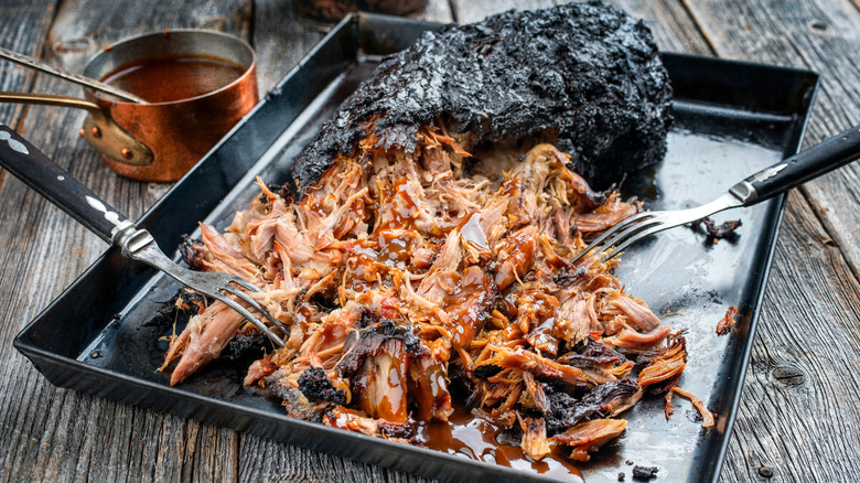 pulled pork on tray with barbecue sauce