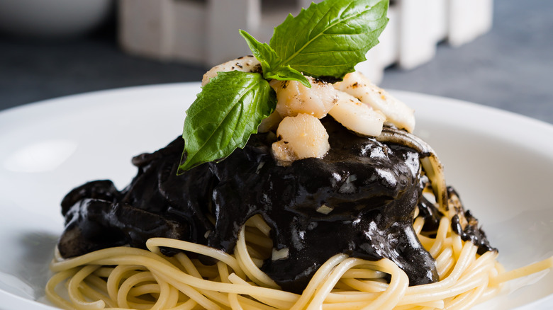 squid ink sauce with spaghetti and scallops