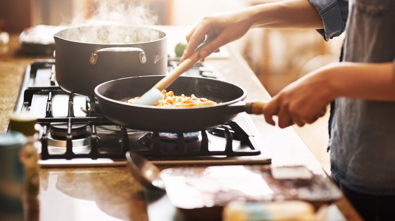 making dinner on the stove