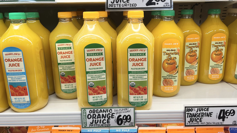 Trader Joe's orange juice bottles on store shelf