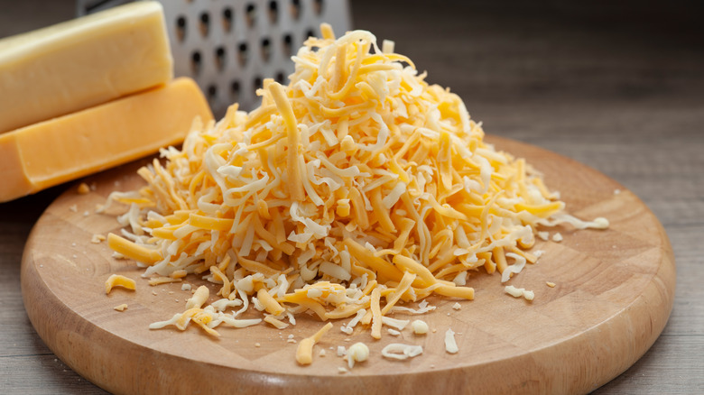 Grated orange and white cheddar cheese