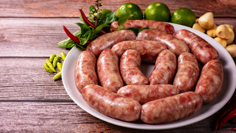 Plate of raw Italian sausages