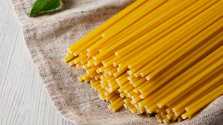 Close-up of bucatini pasta.