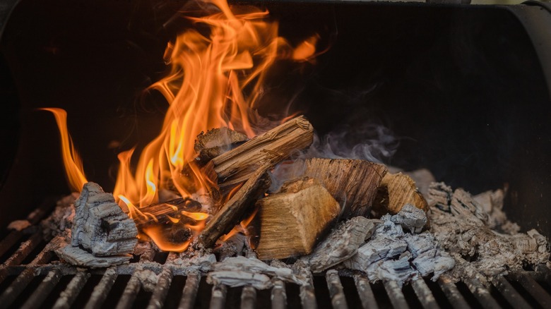 Hickory firewood in a smoker