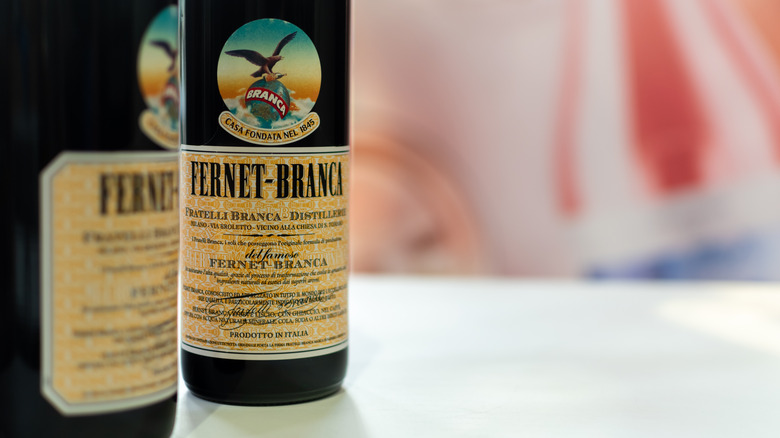 Close-up of two Fernet-Branca bottles