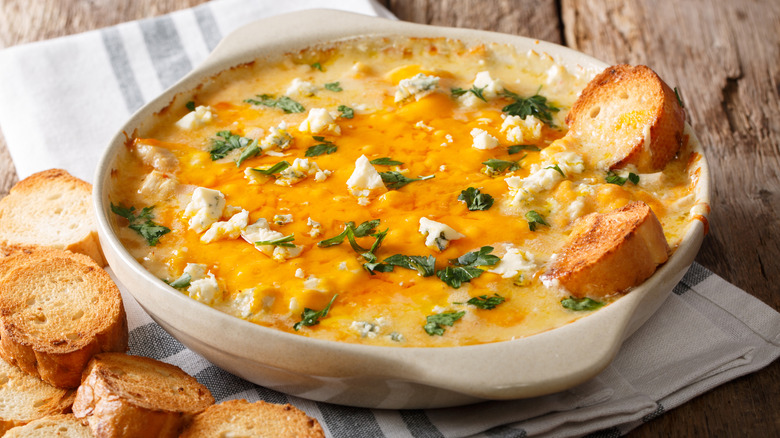 cheesy baked dip with crostinis