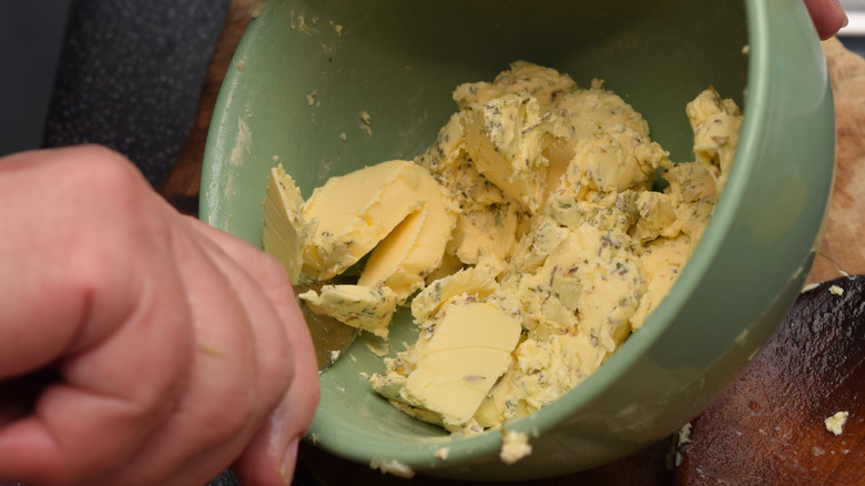 Mixing compound butter in bowl