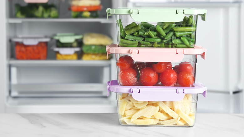 Food containers with veggies.