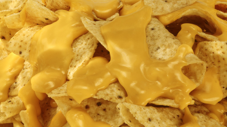 Nacho chips with melted cheese