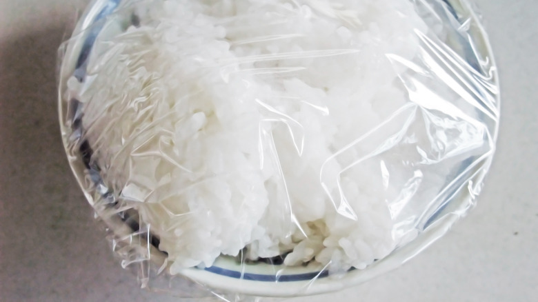 rice covered in plastic wrap