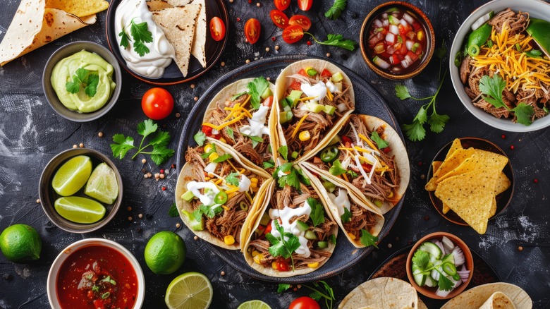 Dish of tacos with toppings