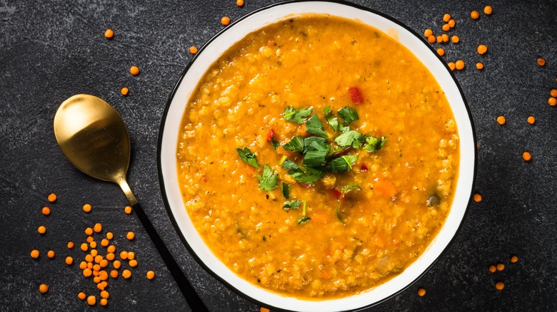 indian dal in a bowl with cumin and other spices