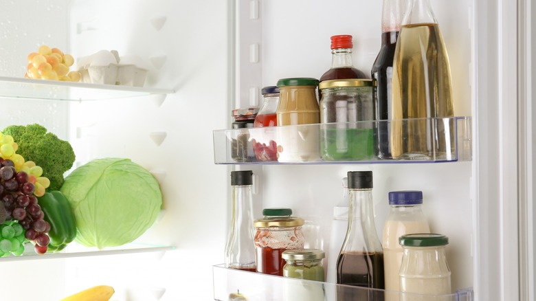 sauces on shelves in fridge