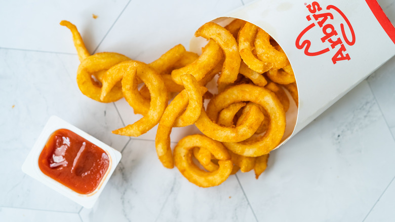 Arby's curly fries with dipping sauce