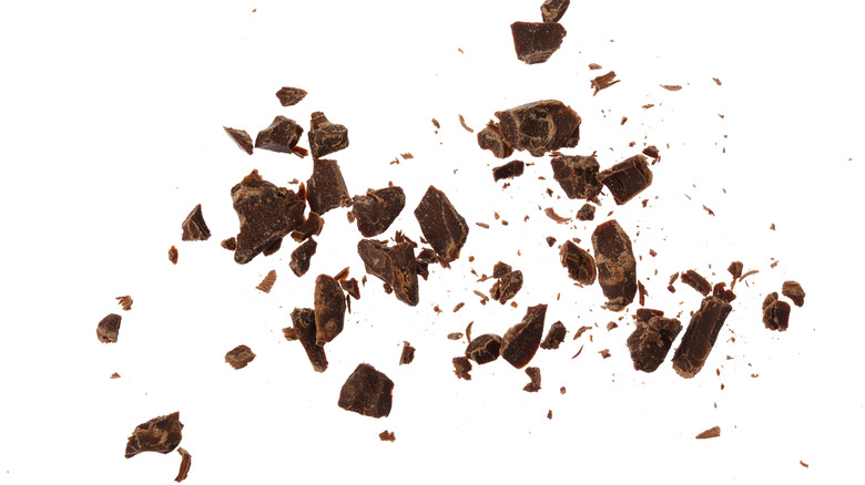 Chocolate shards on white background