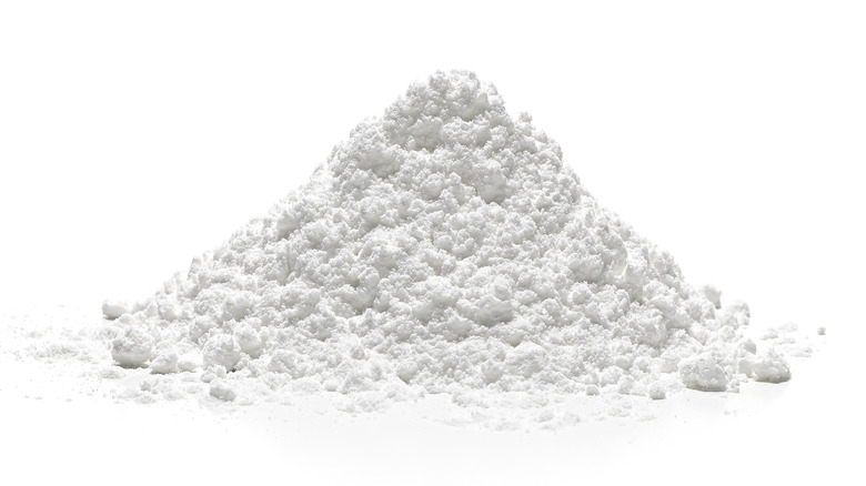 Confectioner's sugar on white background