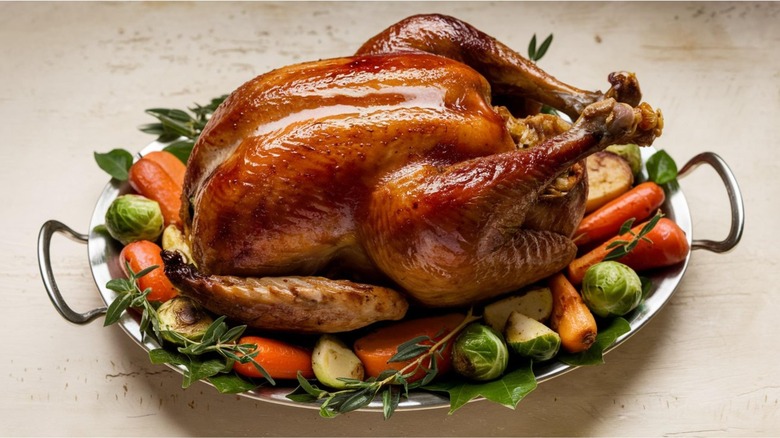 roasted turkey over vegetables