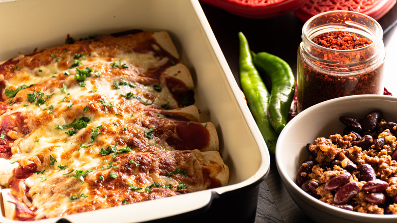 Beef enchiladas in casserole dish