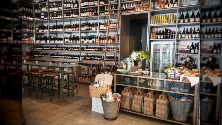 Wine shop walls lined with bottles 