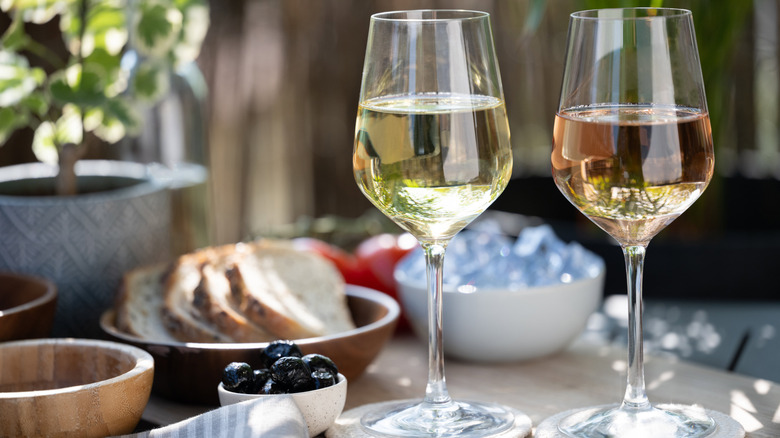 Glasses of white wine on counter