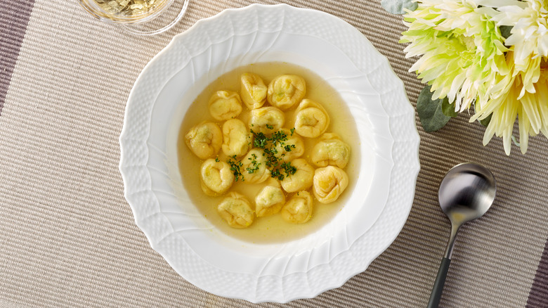 bowl of tortellini in broth