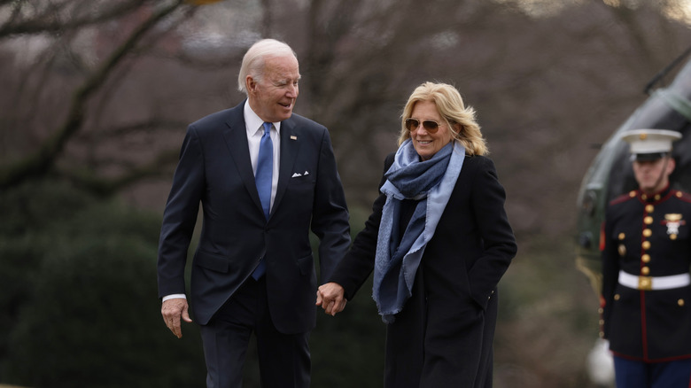 Joe and Jill Biden holding hands