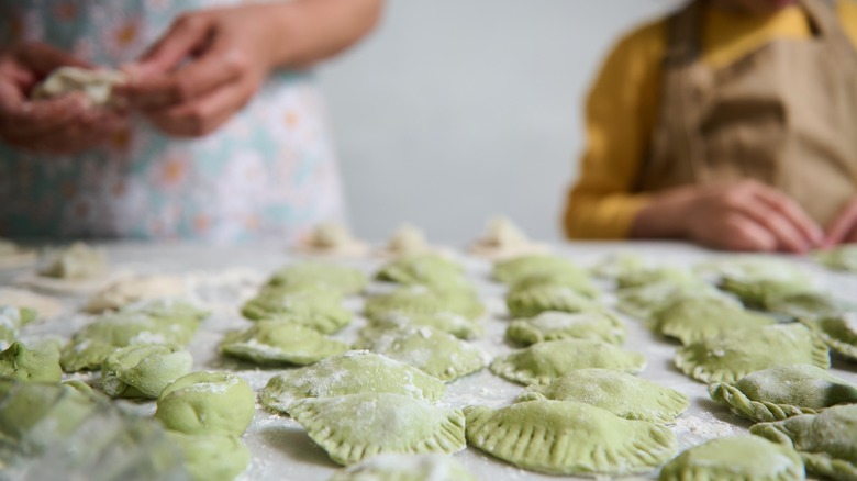 parent and child fold spinach dumplings