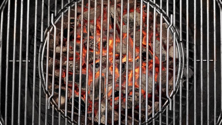 gray charcoal under grill grates