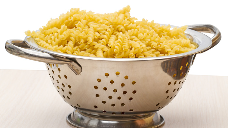 Pasta sitting in strainer